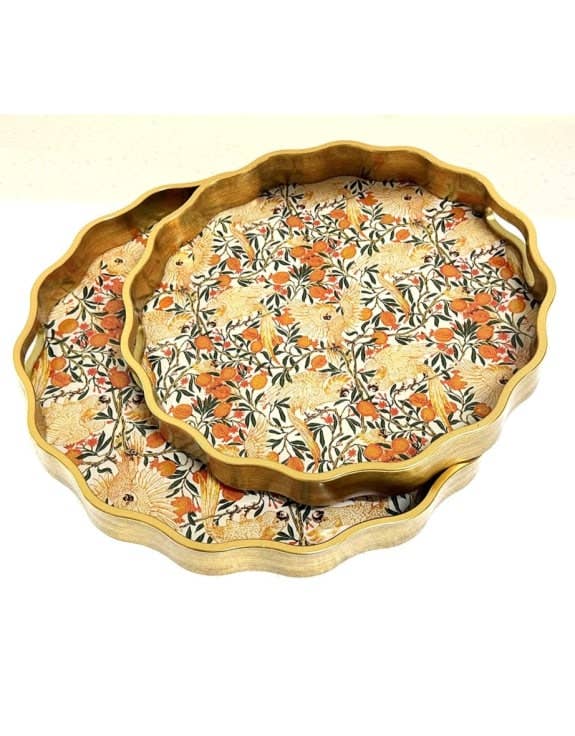 Decorative tray with floral pattern and gold rim on a white background