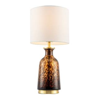 Table lamp with a decorative brown base and white shade on a white background