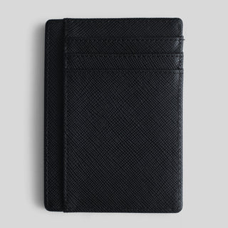 Black textured wallet on a light gray background
