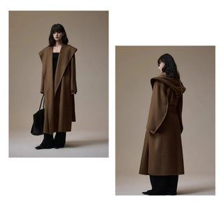 A model is shown wearing a long brown hooded coat from the front and back against a neutral beige studio background. The image includes Chinese text and a small brand name, 'x qing', printed on the layout.