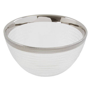 White woven basket with silver rim on a white background