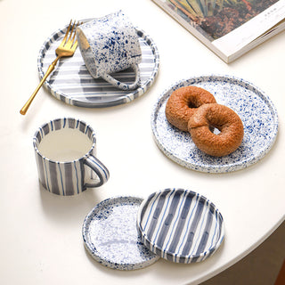 Medieval black striped cup and saucer and plate set