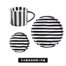 Medieval black striped three-piece cup and saucer set