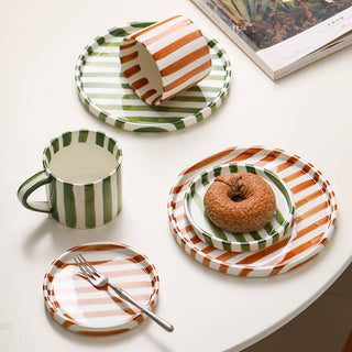 Medieval black striped cup and saucer and plate set