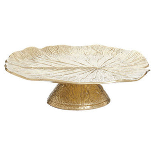 Decorative leaf-shaped pedestal bowl on a white background