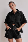 Black top + shorts suit