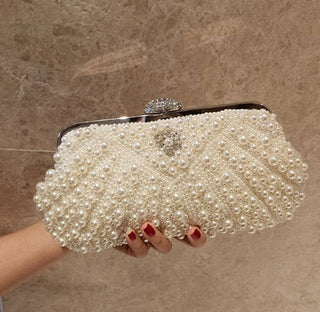 Ivory Pearl in shell shape and soft touch clutch bag