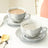 Grey Cups and saucers