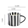 Medieval black striped cup