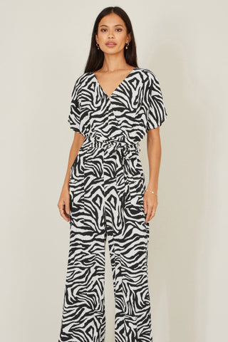 Yumi Black Zebra Print Relaxed Jumpsuit - Hstrends